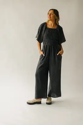 The Slater Smocked Detail Jumpsuit in Washed Charcoal