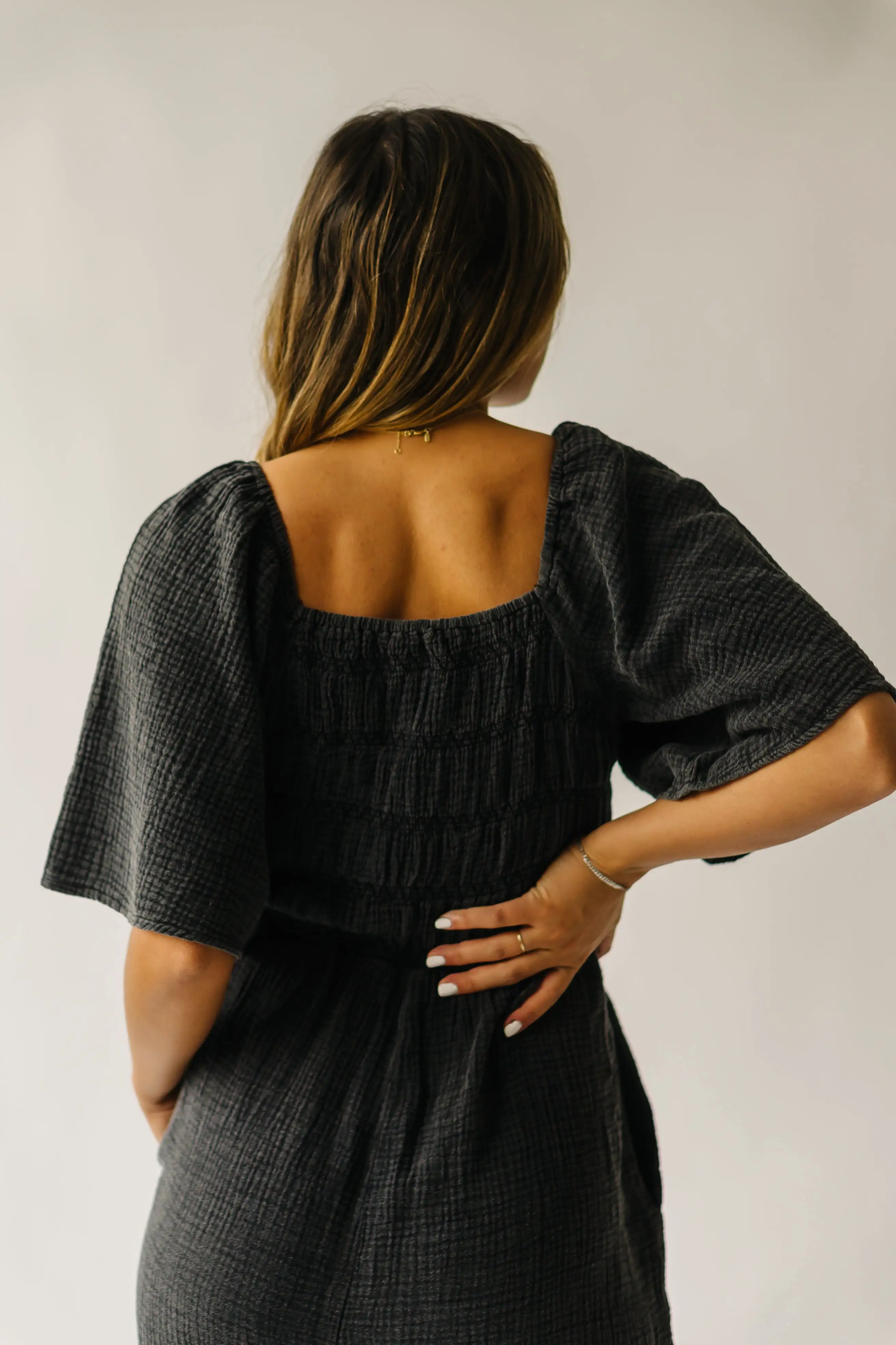 The Slater Smocked Detail Jumpsuit in Washed Charcoal