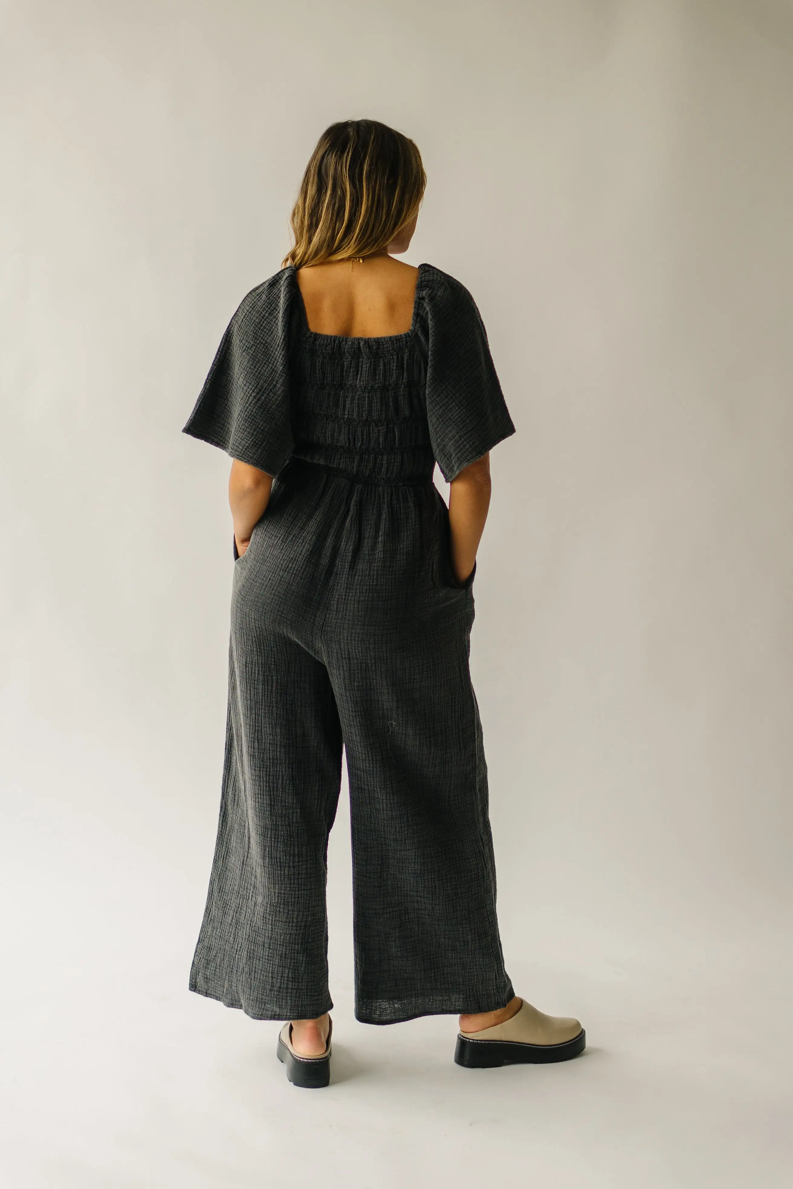 The Slater Smocked Detail Jumpsuit in Washed Charcoal