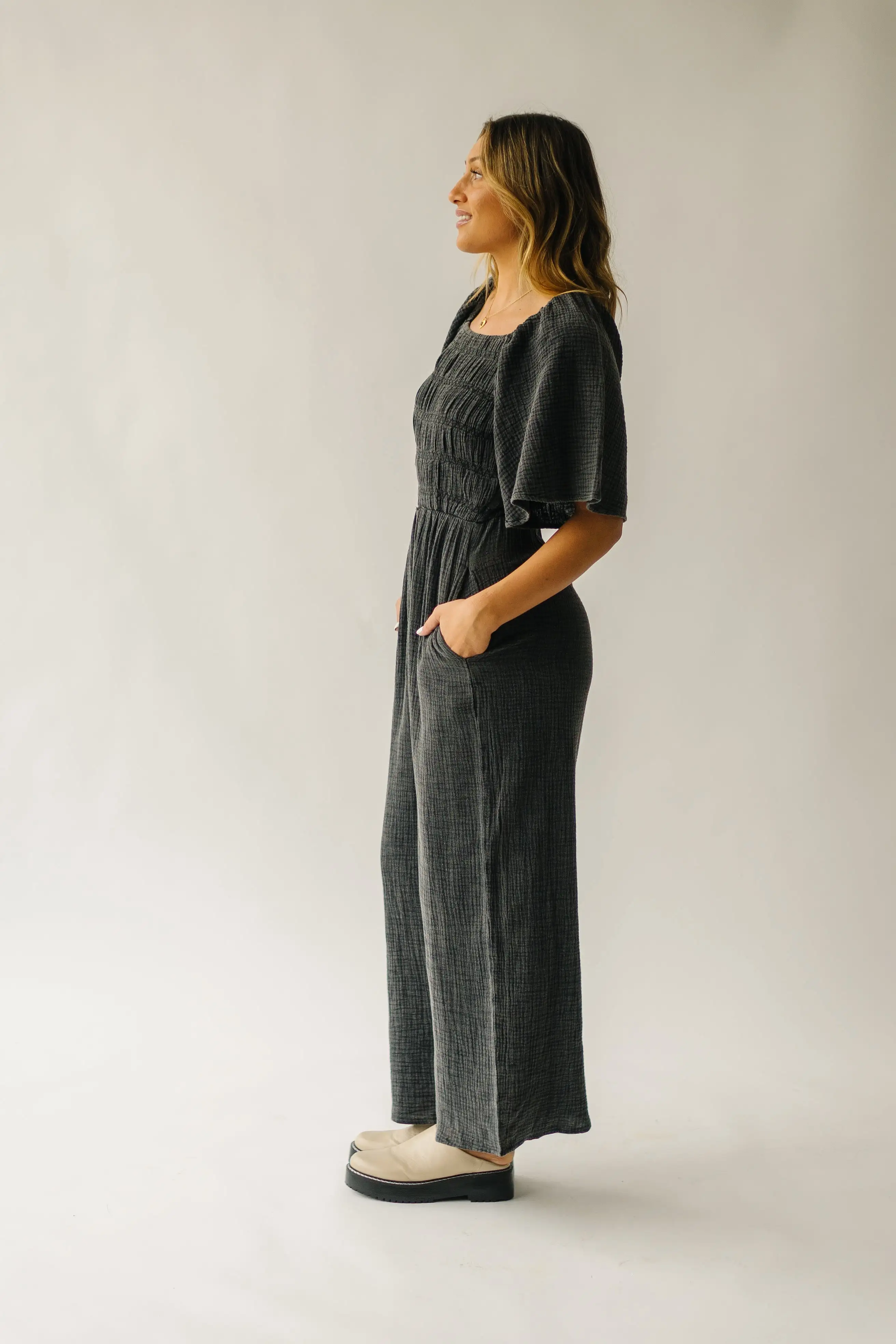 The Slater Smocked Detail Jumpsuit in Washed Charcoal