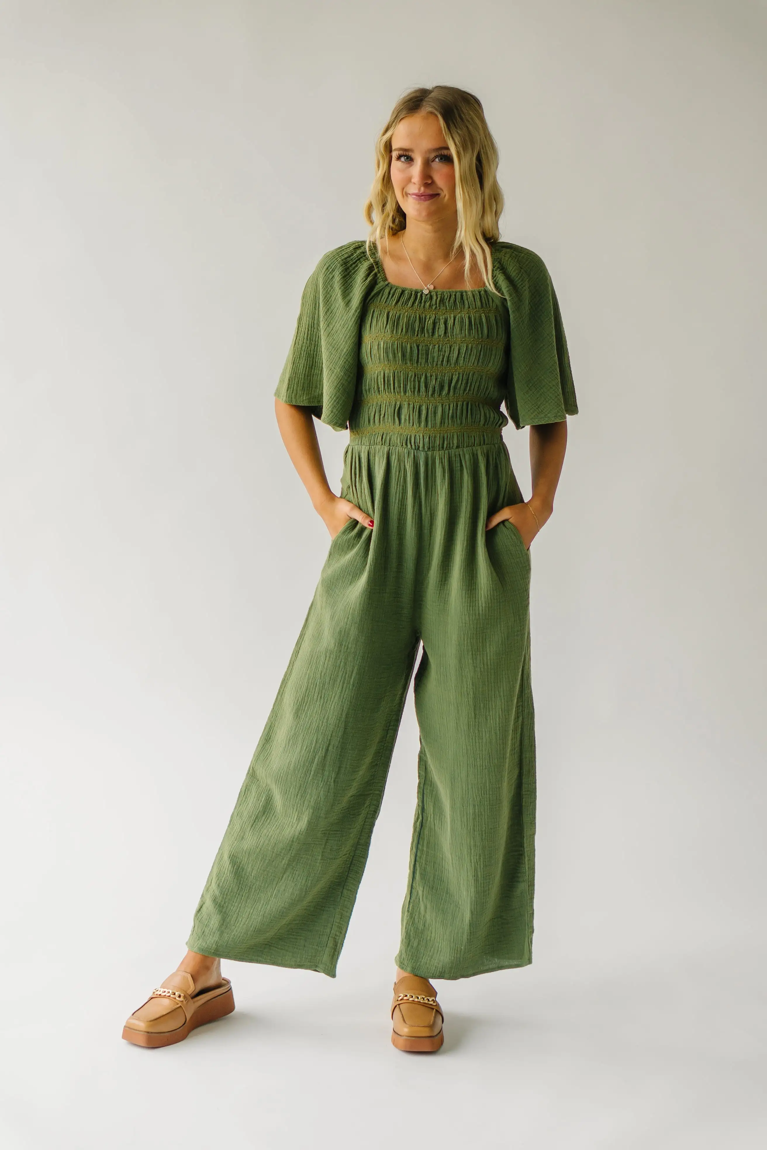 The Slater Smocked Detail Jumpsuit in Washed Green