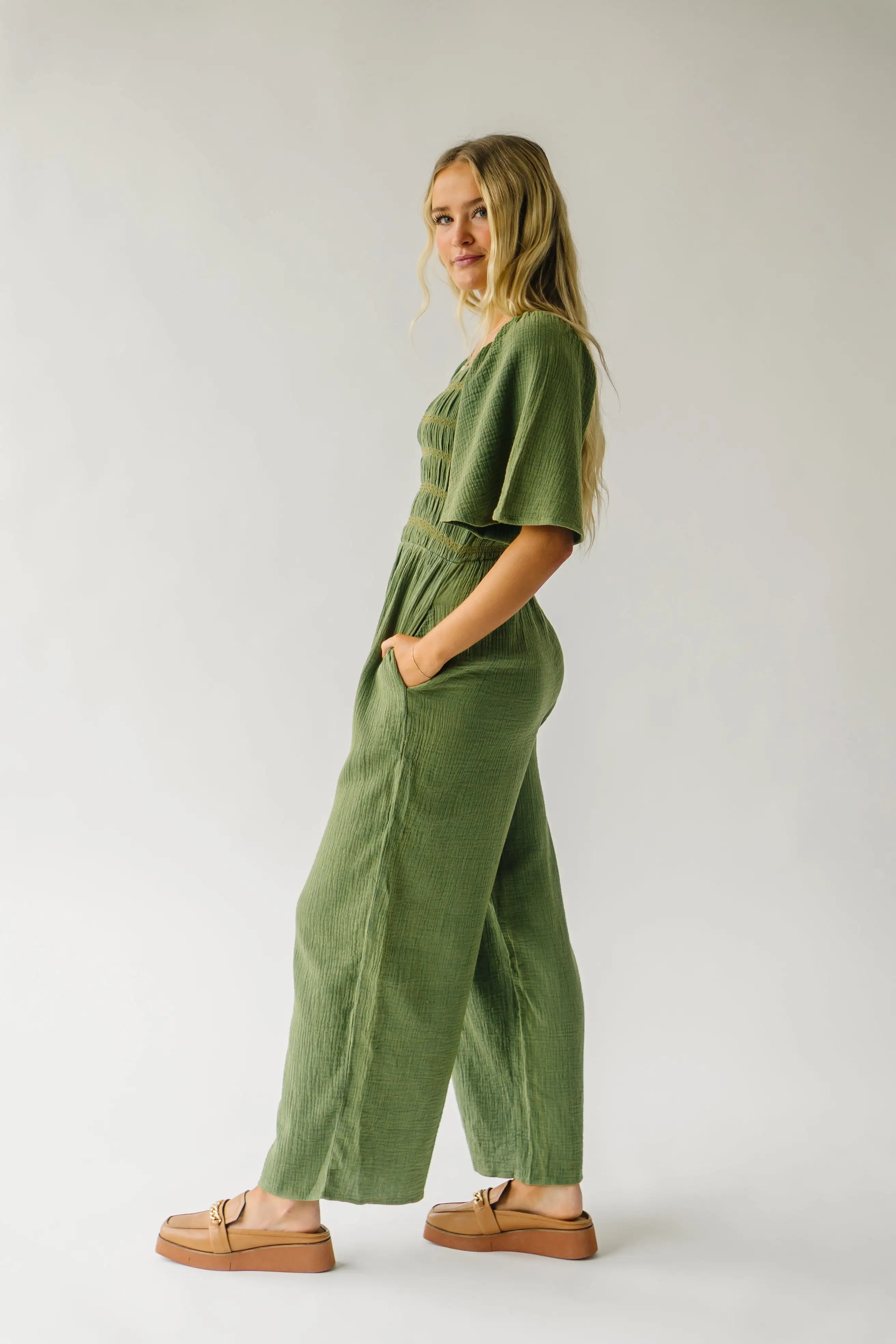 The Slater Smocked Detail Jumpsuit in Washed Green