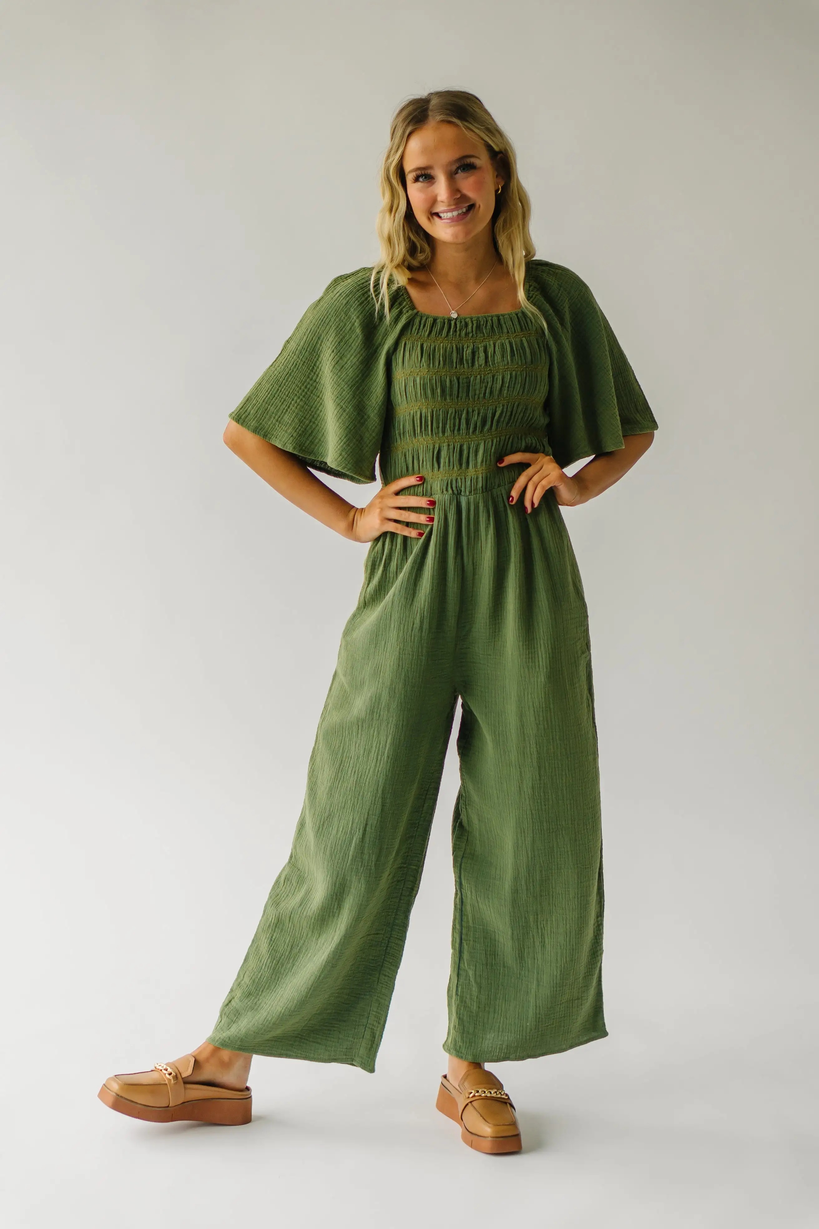 The Slater Smocked Detail Jumpsuit in Washed Green